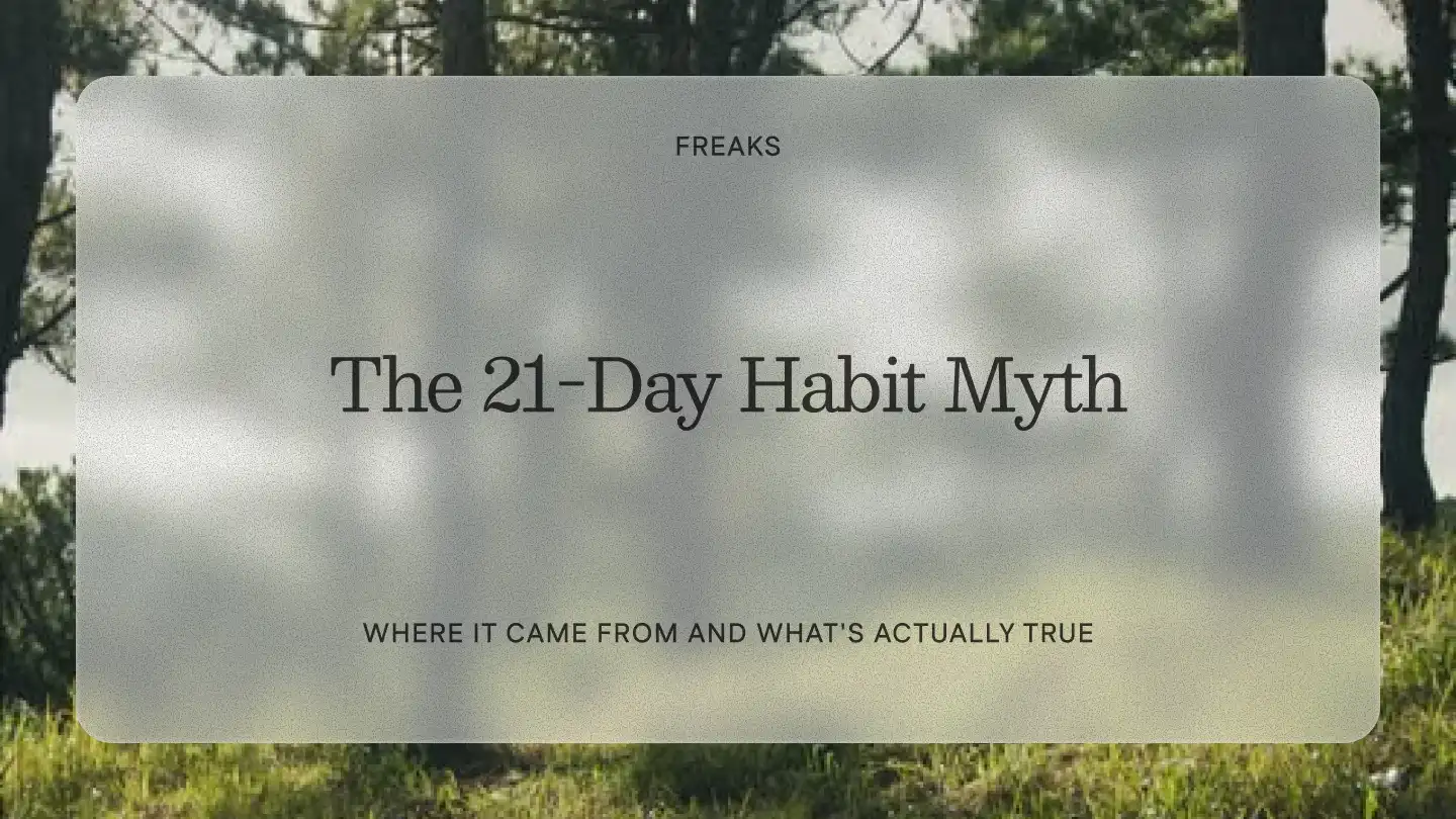 Freaks article title card reading 'The 21-Day Habit Myth', with the subtitle 'Where it came from and what's actually true', over a forest of tall trees and grass