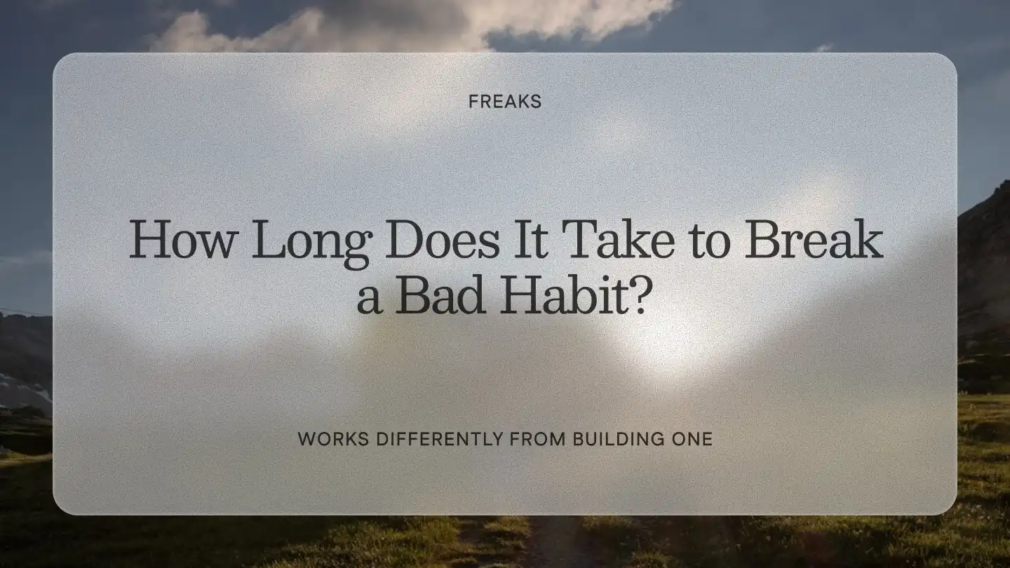 Freaks article title card reading 'How Long Does It Take to Break a Bad Habit?', with the subtitle 'Works differently from building one', over a mountain valley with a path under a cloudy sky