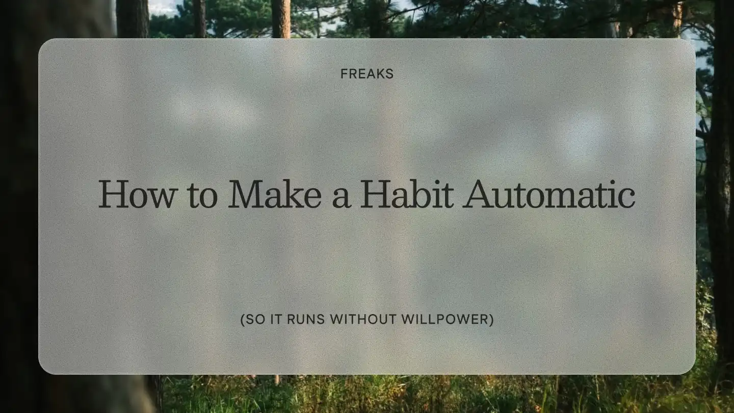 Freaks article title card reading 'How to Make a Habit Automatic', with the subtitle 'So it runs without willpower', over a pine forest with dappled light