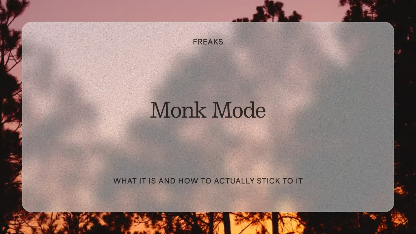 Freaks article title card reading 'Monk Mode', with the subtitle 'What it is and how to actually stick to it', over pine tree silhouettes at a pink sunset