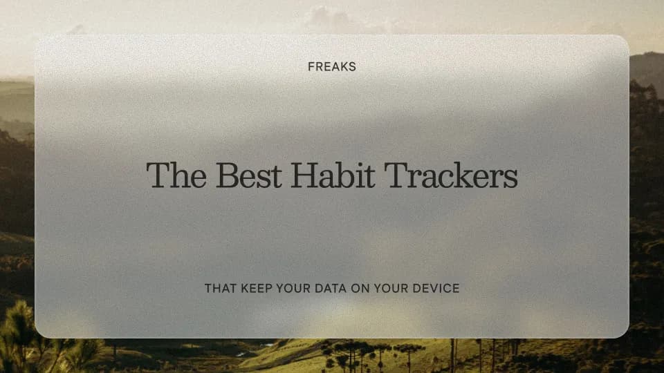 Freaks article title card reading 'The Best Habit Trackers', with the subtitle 'That keep your data on your device', over a soft hilly landscape at dusk